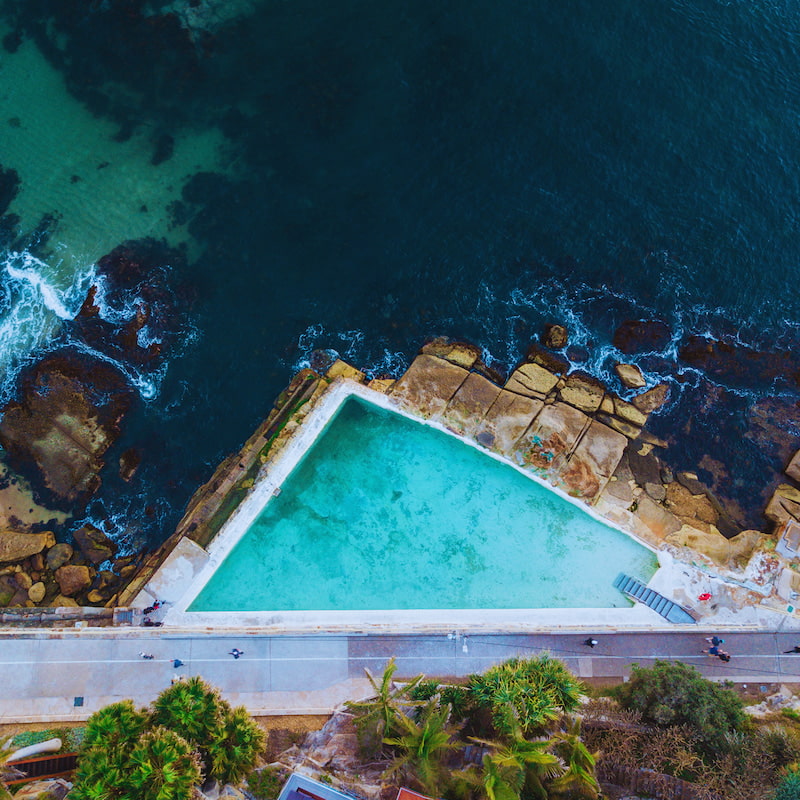 Aerial view of Fairy Bower ocean pool with ocean on one side in Manly Beach on Sydney's Northern Beaches